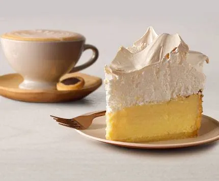 Cup of coffee and a slice of tart