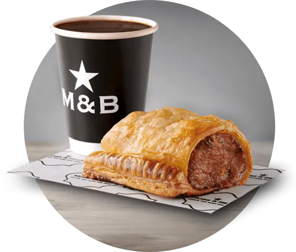Cup of coffee with a sausage roll
