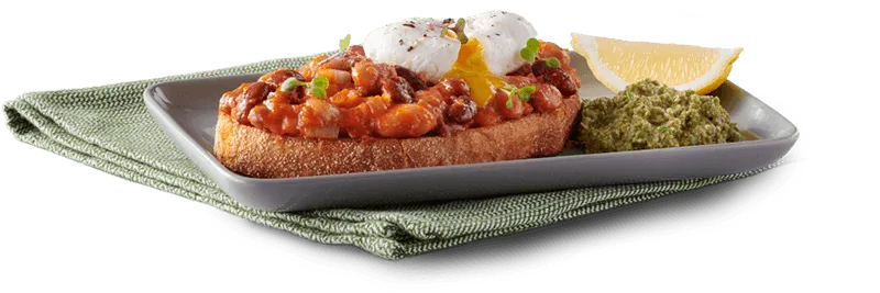 Spicy beans on toast with poached egg