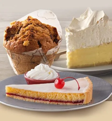 Giant muffin, slide of cake and slice of tart