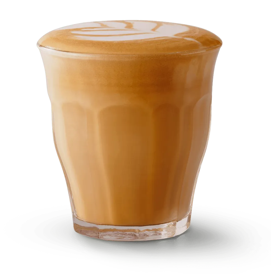 A shot of Cortado in a clear glass