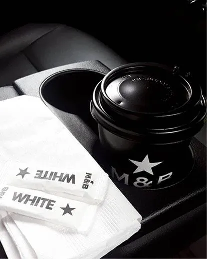 M&B Takeaway coffee in car cup holder