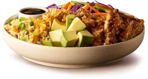Bowl of sesame-crusted beef, vegetables, avocado slices